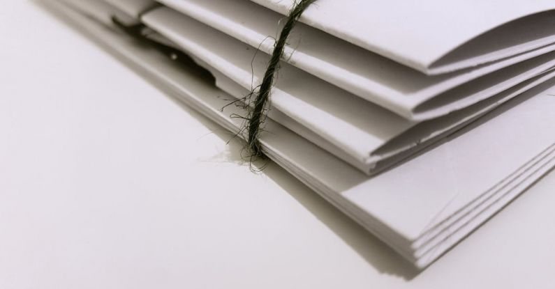 Documents - White Paper Folders With Black Tie